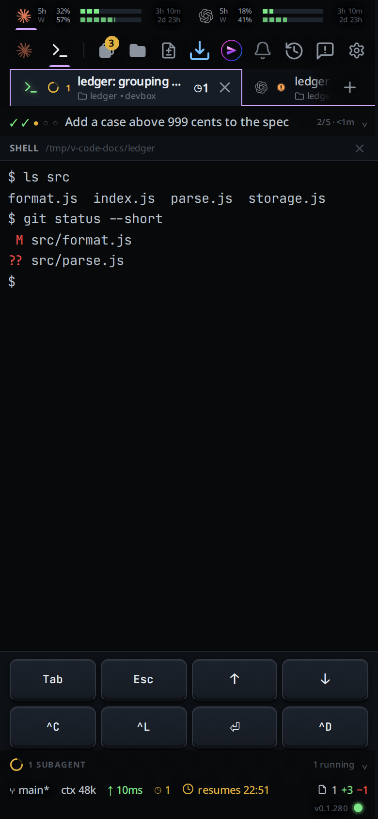 The terminal filling the screen with ls, git status and a $ prompt, and the keypad under it.